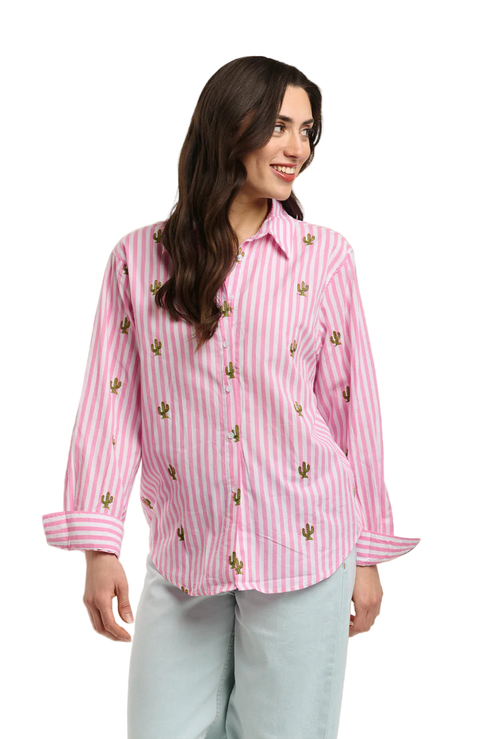 Italian Star Women's Cactus L/S Shirt. Woman wearing a pink striped shirt with cactus patterns in an outdoor setting.