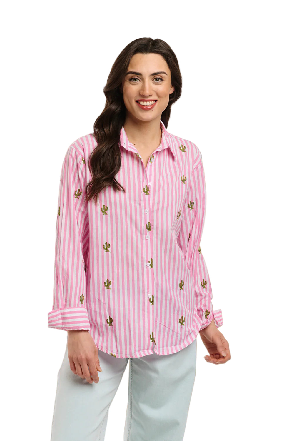 Italian Star Women's Cactus L/S Shirt. Woman wearing a pink striped shirt with cactus patterns in an outdoor setting.