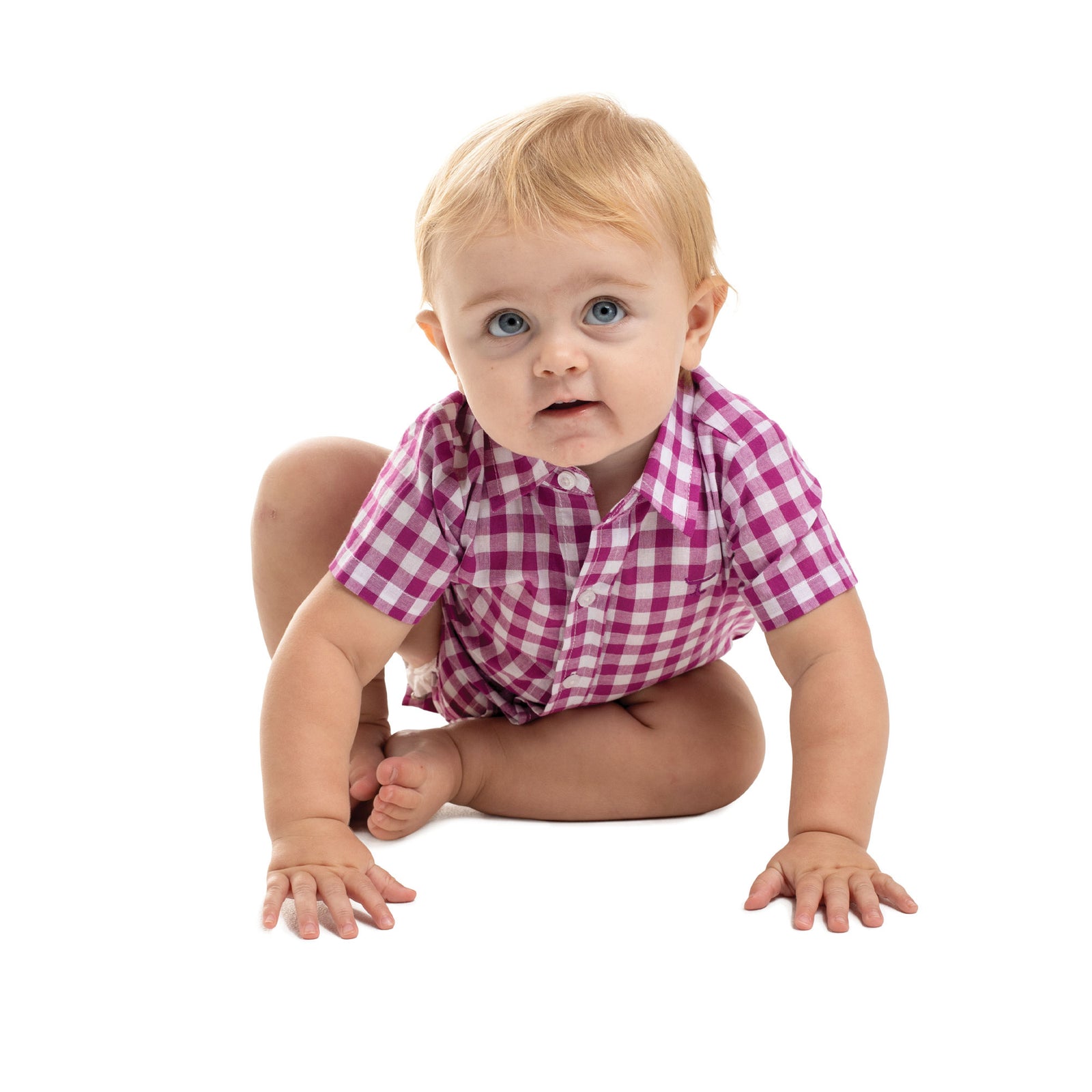 Baby in a pink and white checkered shirt on a white background