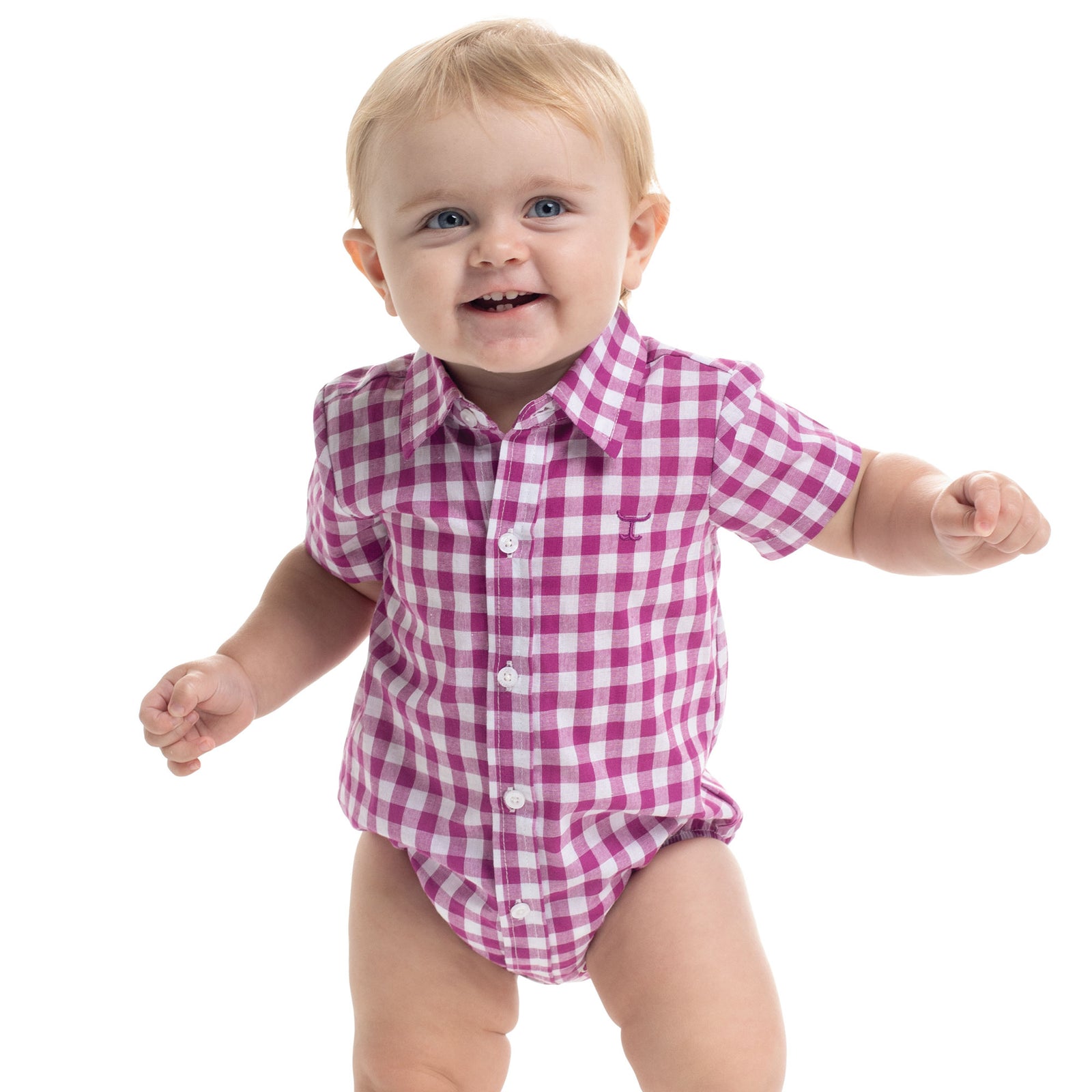 Baby wearing a pink and white checkered onesie on a white background