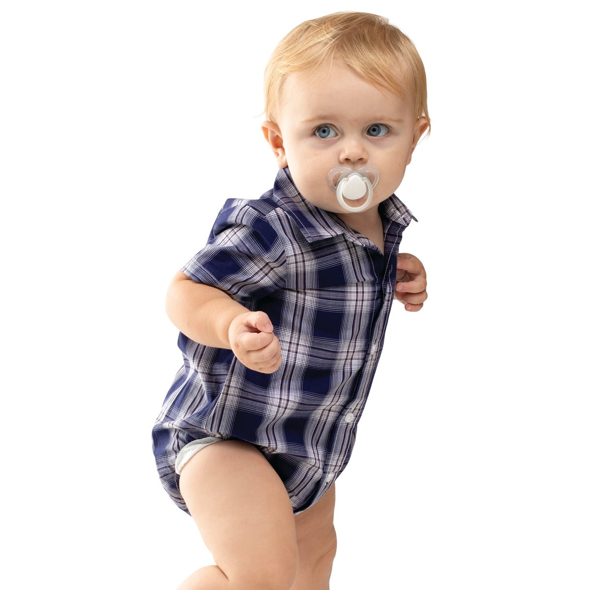 Baby wearing a blue plaid shirt over a diaper on a white background