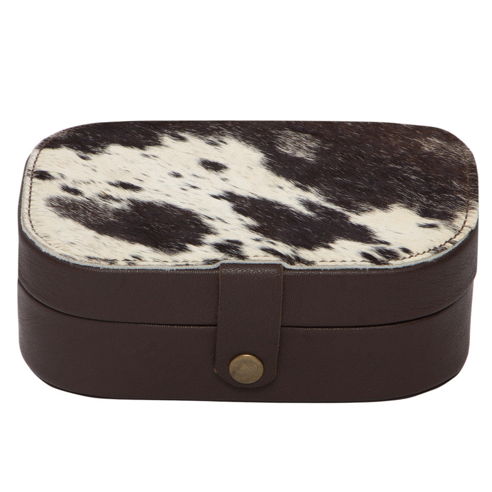 Cowhide Travel Jewellery Box. Jewelry box with cowhide leather top and brown leather body on a white background