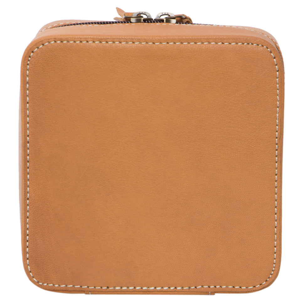 Tooling Cowhide Jewellery Box. Brown leather wallet with a zipper on a white background