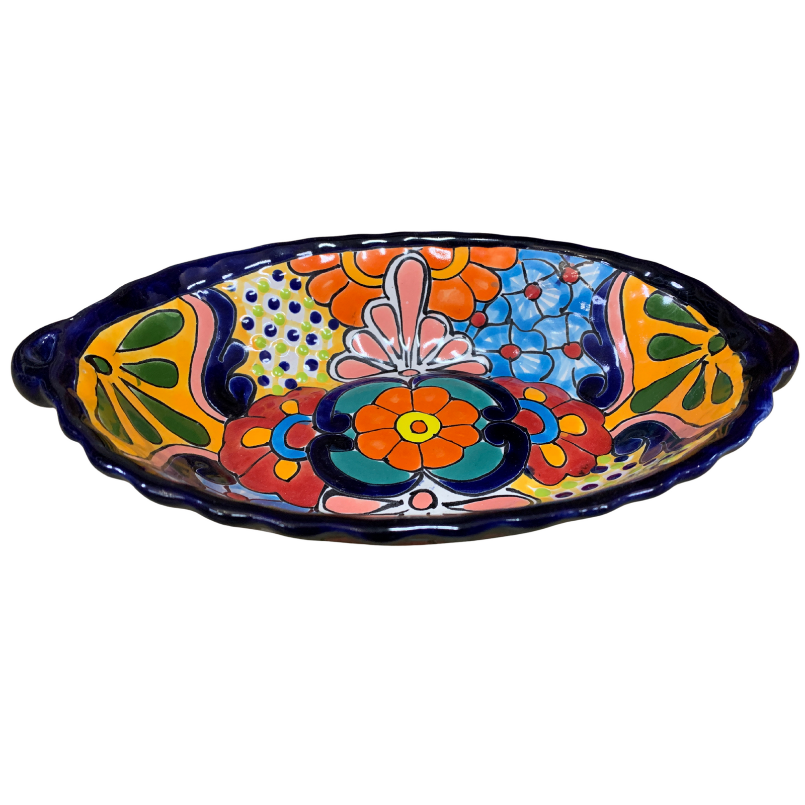 Talavera Bowl. Colorful ceramic dish with floral patterns on a white background