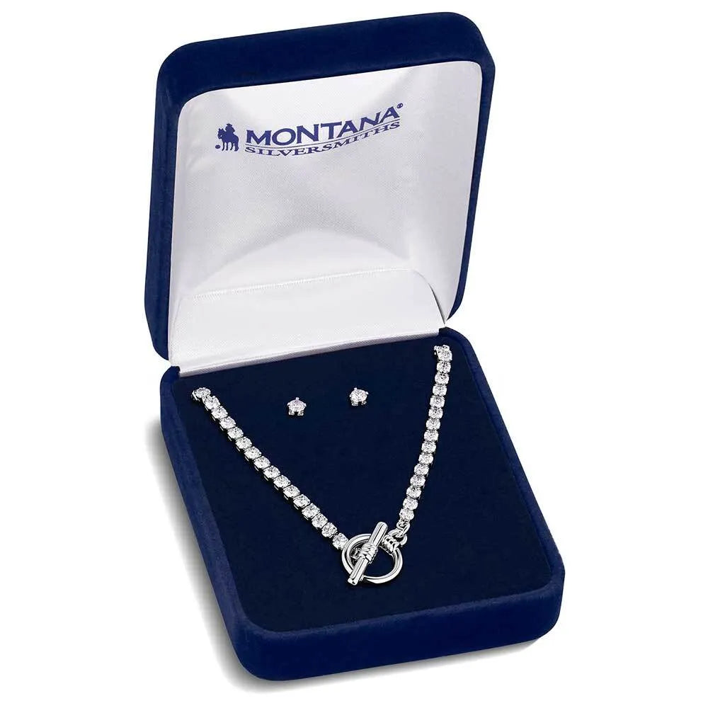 Silver necklace and earrings set in a Montana Silversmiths box on a white background