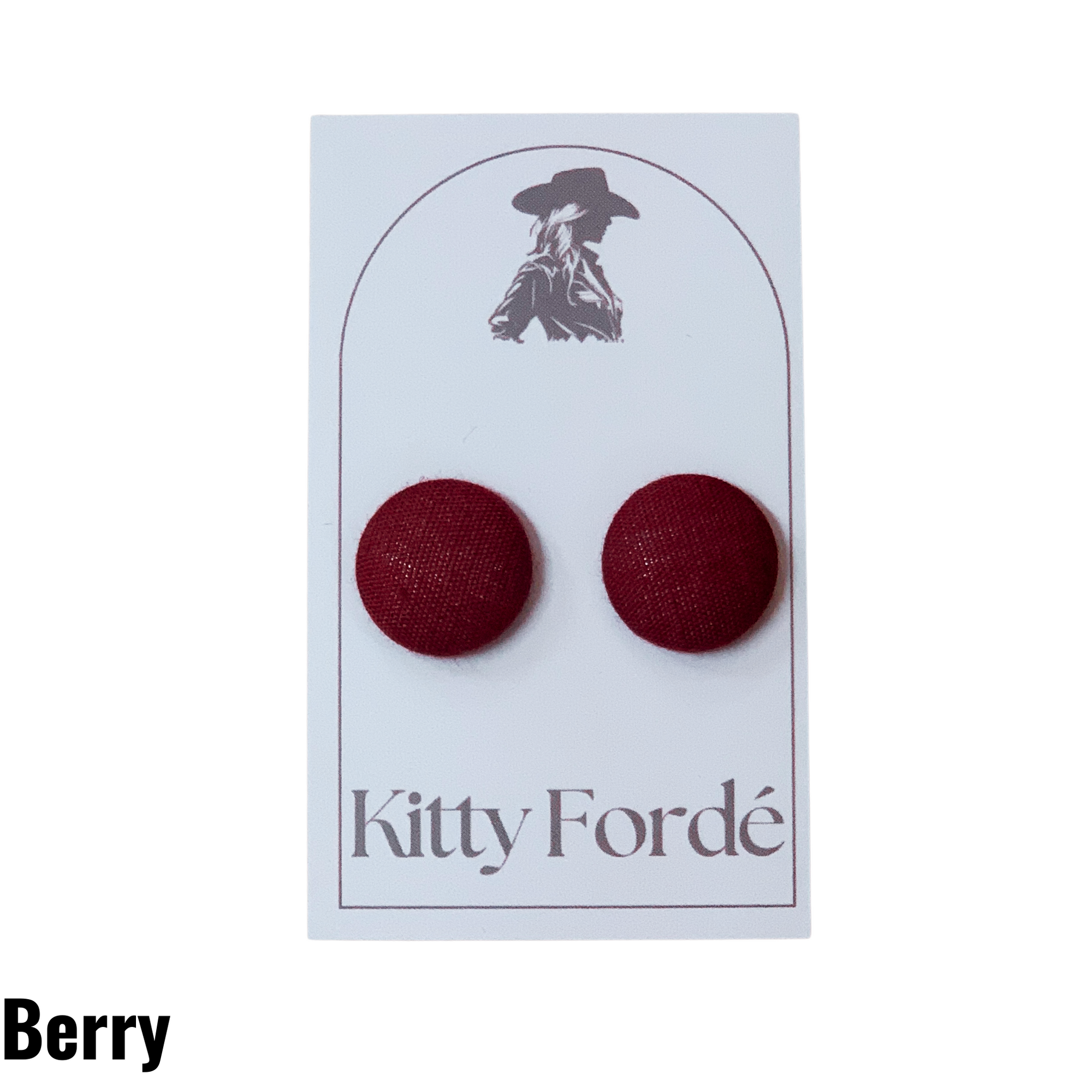 Kitty Fordé blush earrings on a branded card with a white background