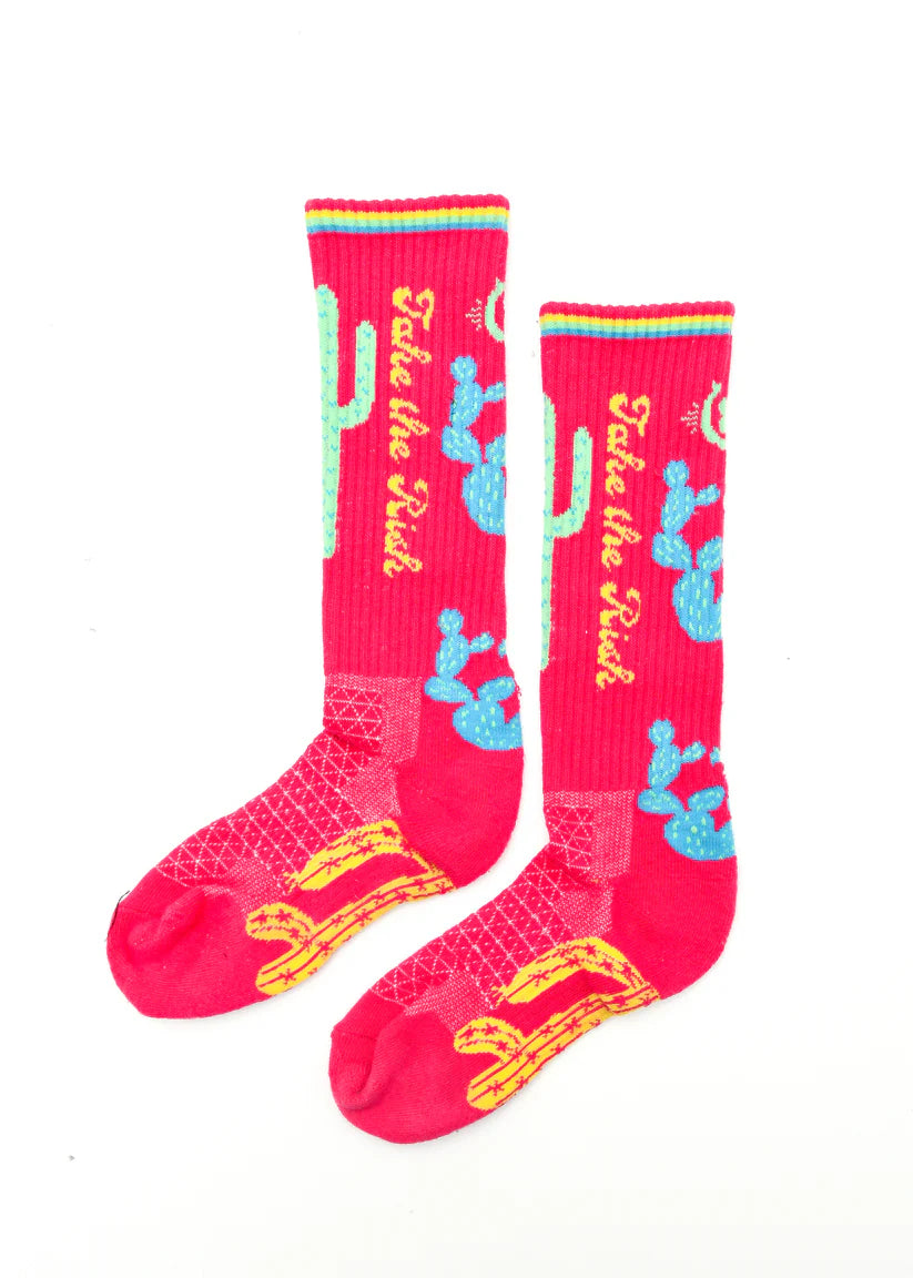 Lucky Chuck Take the Risk Performance SocksPink socks with cactus designs and text on a white background 
