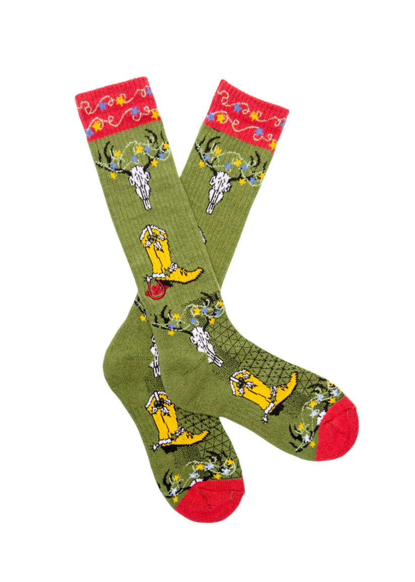Lucky Chuck Get a Little Western Performance Socks. Green socks with yellow cowboys and red accents on a white background