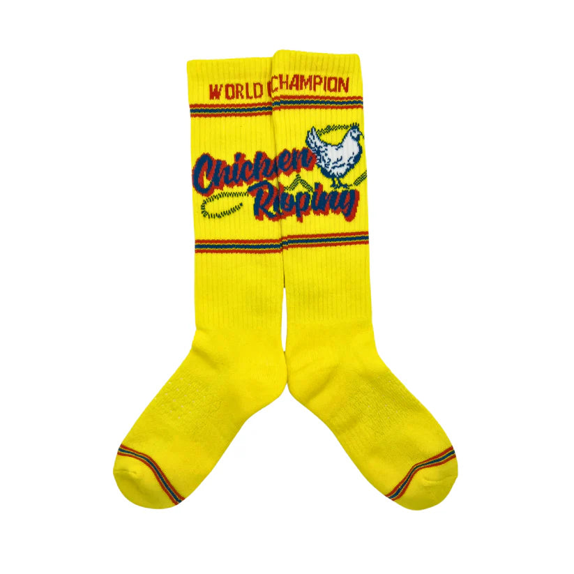 Lucky Chuck Cactus Alley Chicken Roping Performance Socks. Yellow socks with &#39;World Champion Chicken Racing&#39; text and chicken graphic on a white background