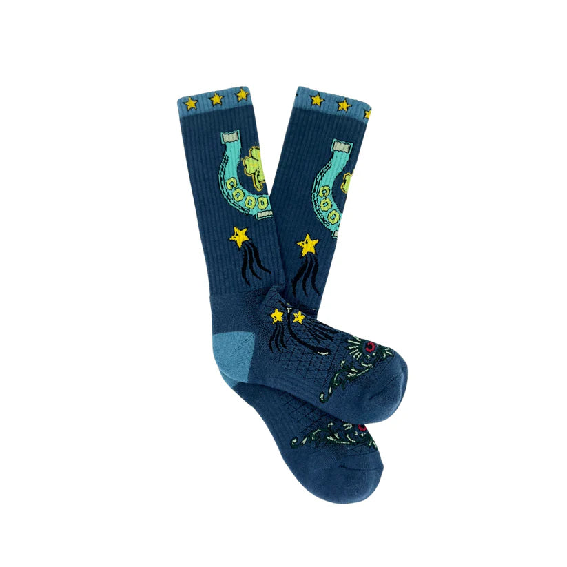 Lucky Chuck Fringe Lucky Horseshoe Performance Socks. Blue socks with lucky charm design on a white background