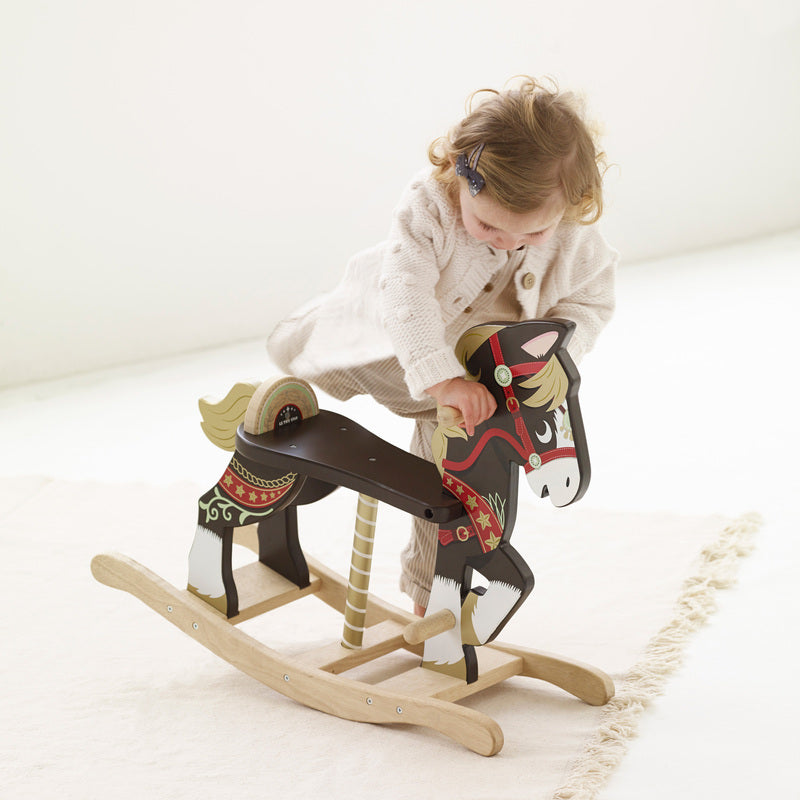 Kaleidoscope Classic Wooden Rocking Horse. Wooden rocking horse with decorative elements on a white background
