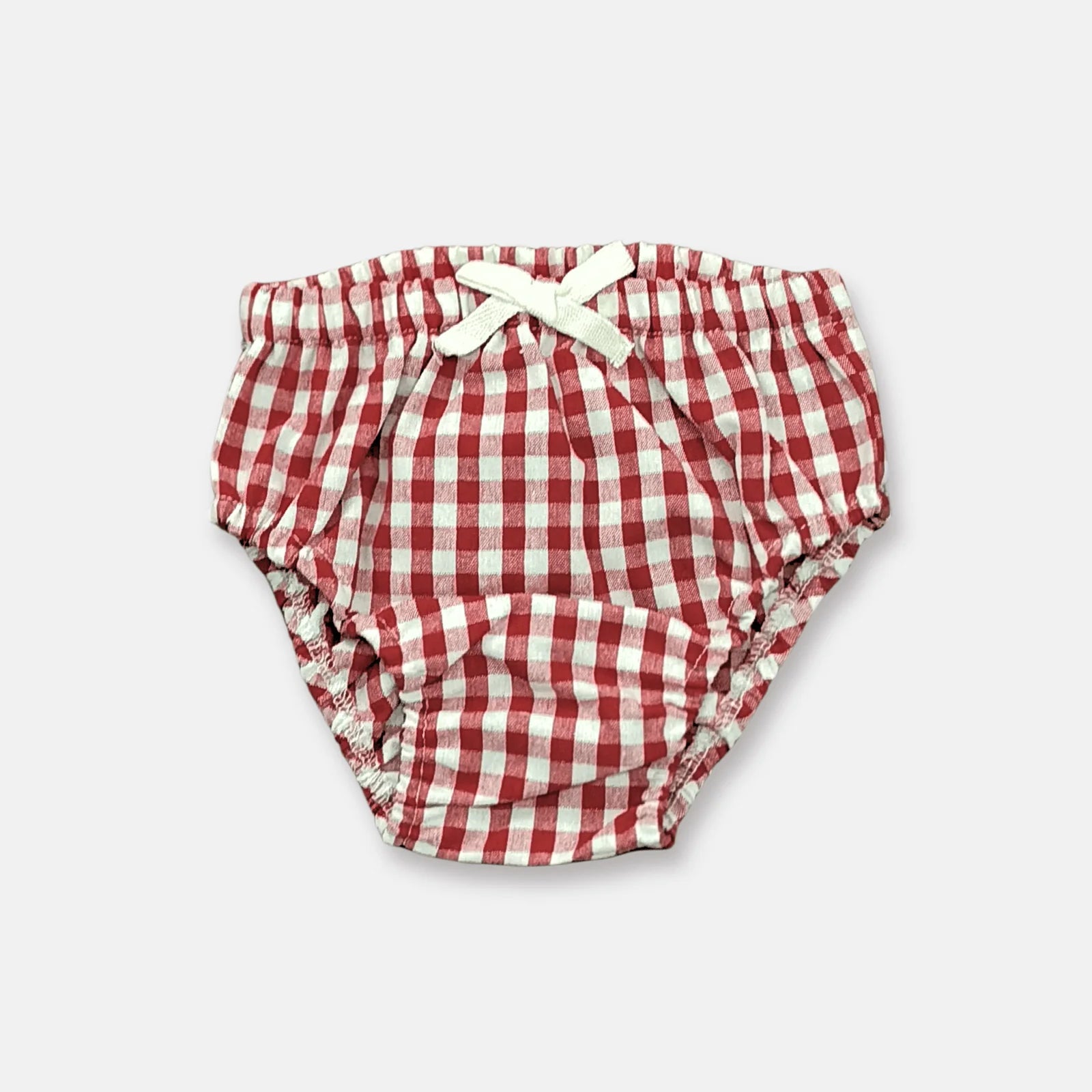 Love Henry Infant Girl's Pilcher. Red and white checkered baby girl's diaper cover with a elastic waistband and decorative white tie.