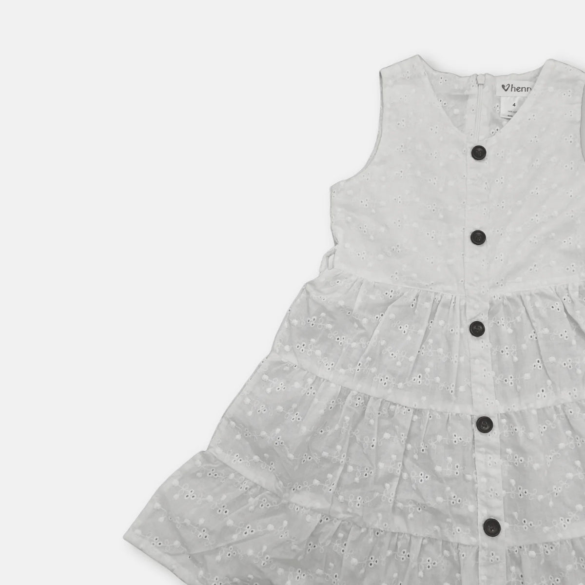 Love Henry Girl's Alice Dress. A sleeveless white dress with a V-neck, buttons down the front, and an A-line gathered skirt, designed for girls.