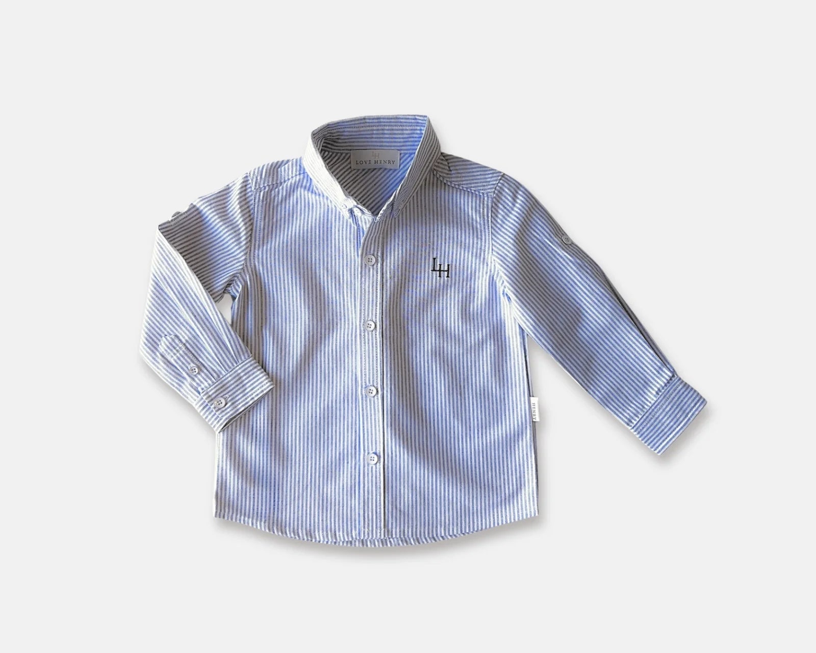 Love Henry Boy's Oxford Dress Shirt. A button-down, long-sleeved boy's Oxford dress shirt with a collar, button placket, and roll-up sleeves with a sleeve tab, in blue and white stripes.