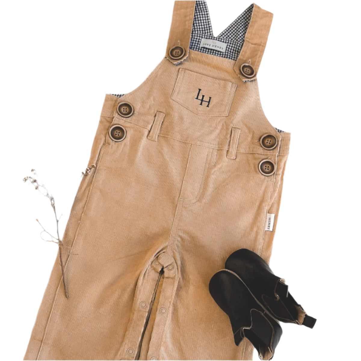 Love Henry Baby Boy's Roy Dungaree. . Tan leather overalls with buttons and a logo on a white background