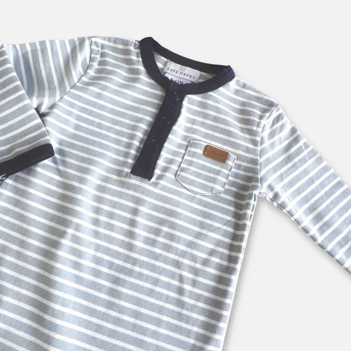 Love Henry Baby Boy's Winter Onesie. Striped onesie with a pocket on a white background