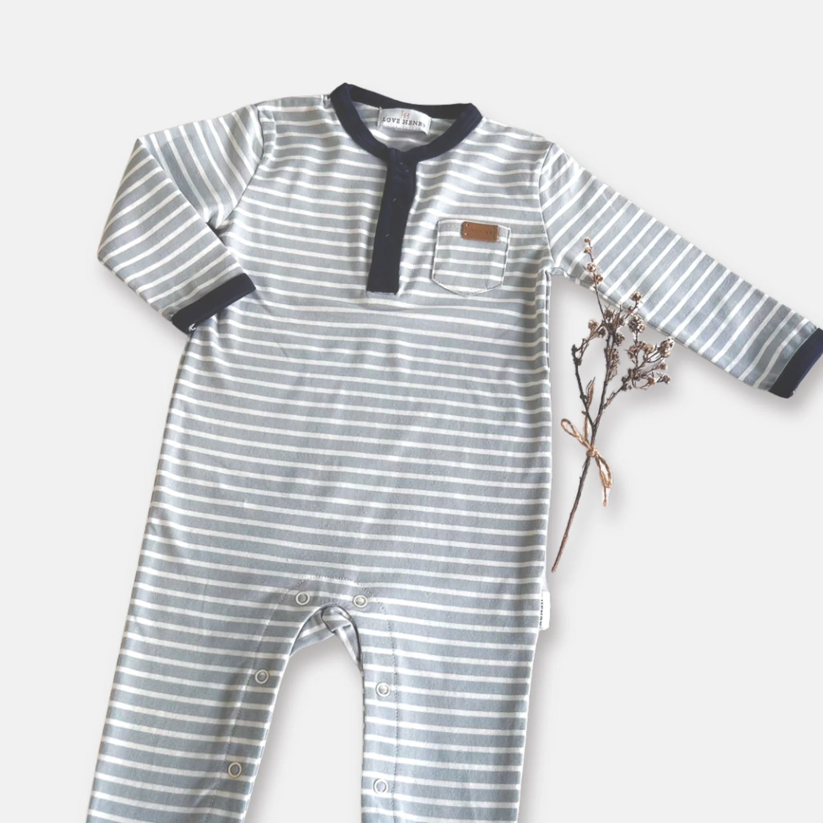 Love Henry Baby Boy's Winter Onesie. Striped onesie with a pocket on a white background