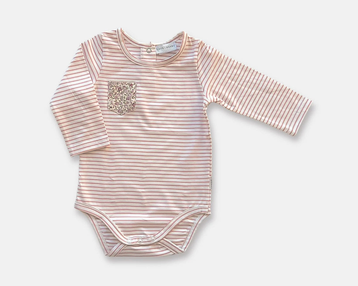 Love Henry Baby Girl&#39;s Knit Romper. A striped pink and white knit romper for baby girls with a floral embellishment on the chest area and long sleeves.