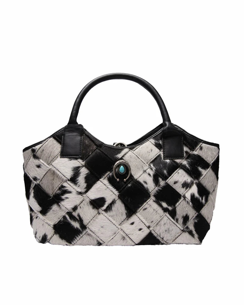 Black and white checkered handbag with a turquoise stone on a white background
