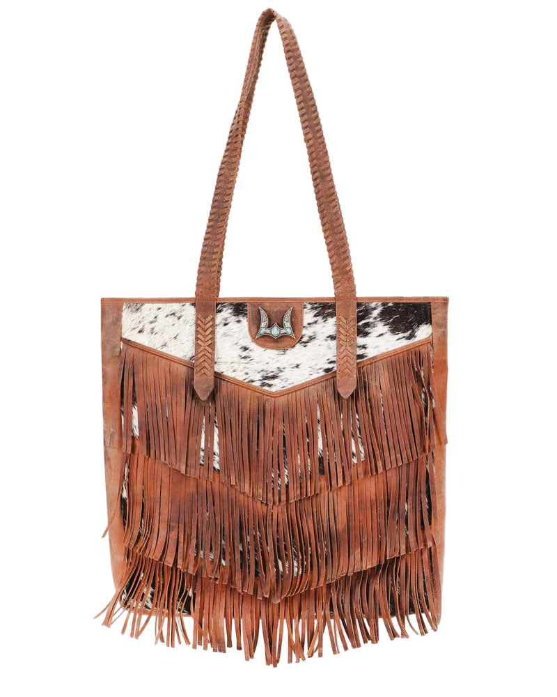 Loyal West Hide And Fringe Large Cowhide Western Handbag. Brown fringe handbag with cow print pattern on a white background