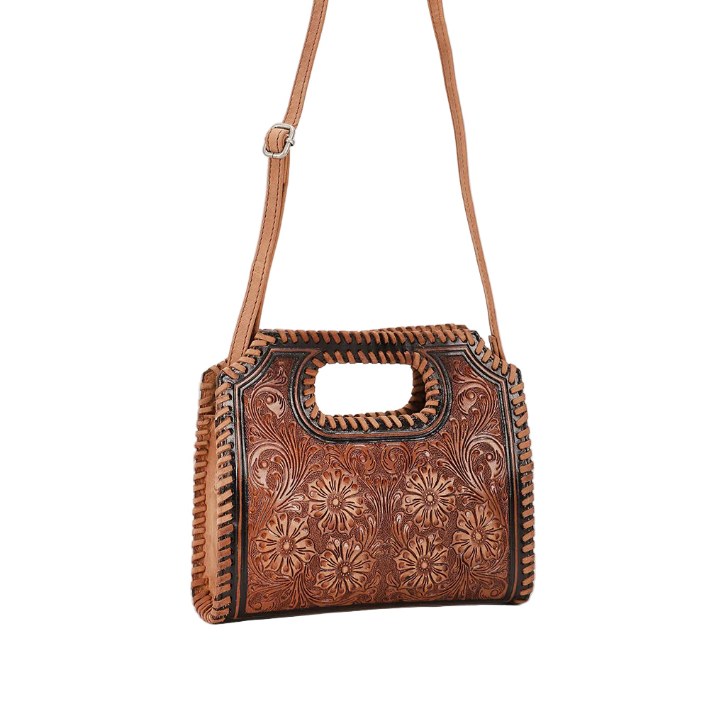 Loyal West Alma Medium Western Handbag. Brown leather handbag with intricate patterns on a white background