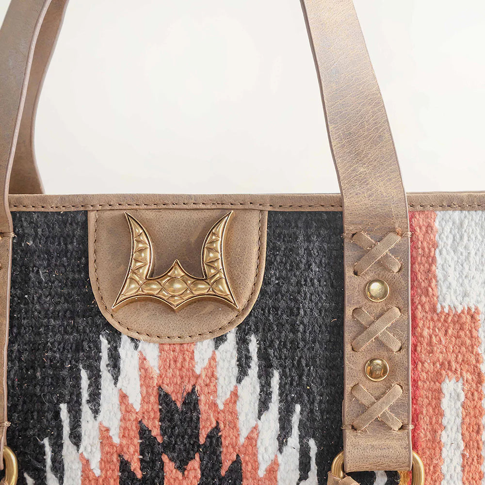 Loyal West Country Medium Western Handbag Black. Handbag with patterned design and gold accents on a white background