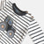 Love Henry Baby Boy's Applique L/S Tee. Striped long-sleeve shirt with a truck design on a light gray background