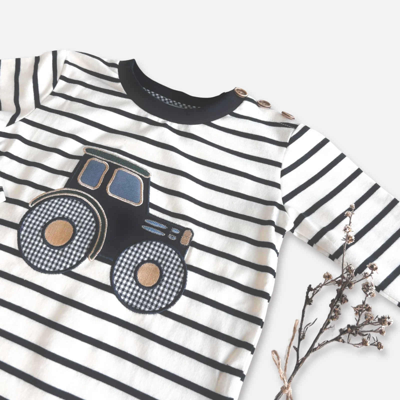 Love Henry Baby Boy's Applique L/S Tee. Children's shirt with striped pattern and toy truck design on a white background