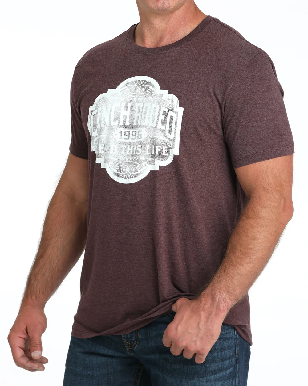 Cinch Men's Graphic Tee. Man wearing a brown t-shirt with a white graphic design on a white background