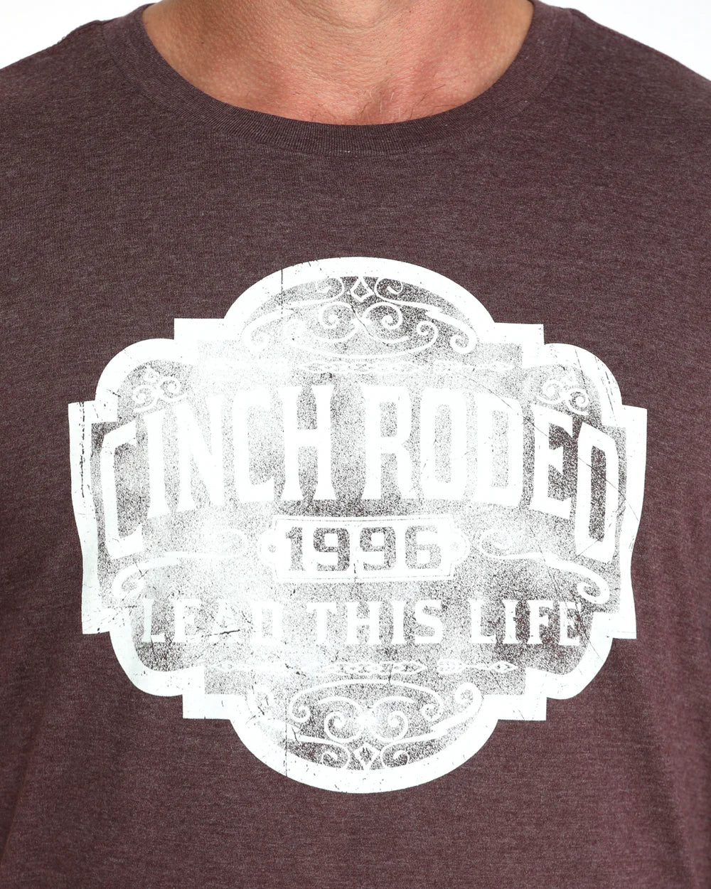 Cinch Men's Graphic Tee. Dark brown t-shirt with white graphic design on a plain background