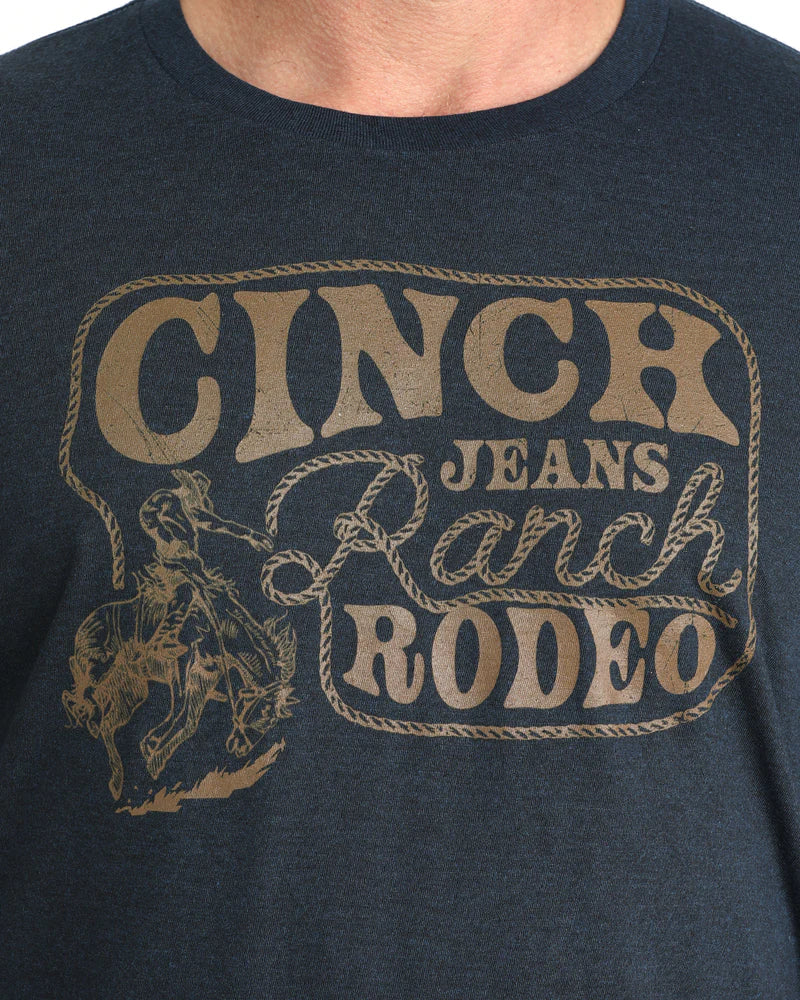 Navy blue t-shirt with 'Cinch Jeans Ranch Rodeo' graphic design.