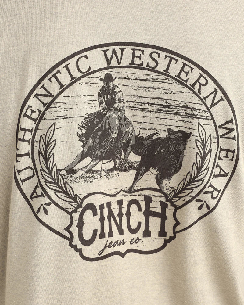 Cinch Jean Co. logo on a beige background with a cowboy and horse illustration.