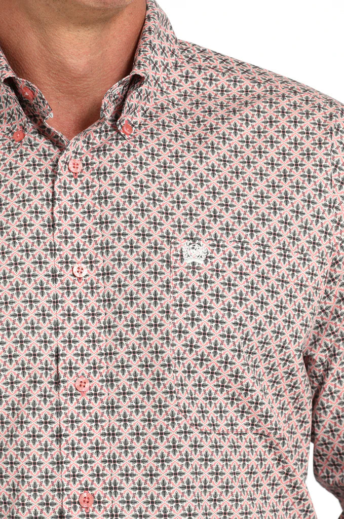 Cinch Men's Floral Print L/S Western Shirt. Man wearing a patterned long-sleeve shirt and jeans with a belt buckle.