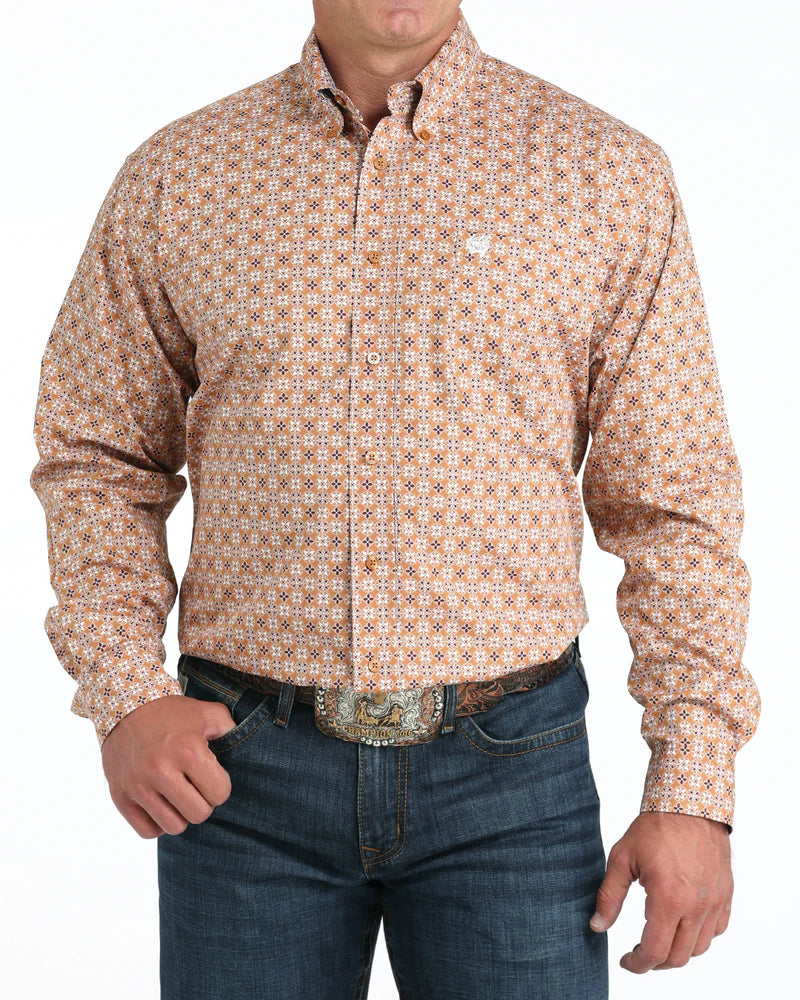 Cinch Men's Classic Fit Button-Down Western Shirt. Man wearing a patterned shirt and jeans on a white background