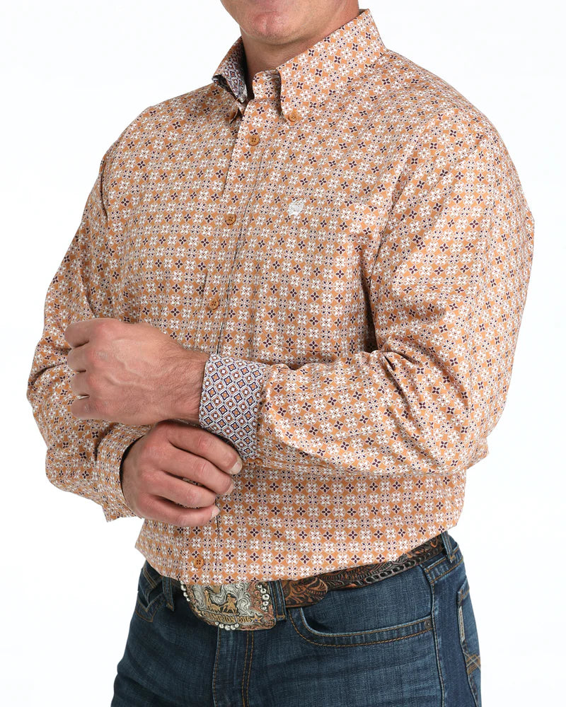 Cinch Men's Classic Fit Button-Down Western Shirt. Man wearing a patterned shirt and jeans on a white background
