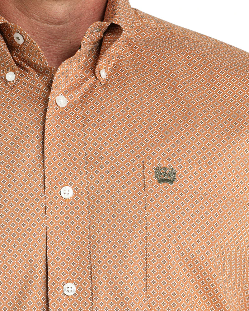 Cinch Men's Stretch Classic Fit Button-Down Western Shirt. Close-up of a brown patterned shirt with a brand logo on a white background