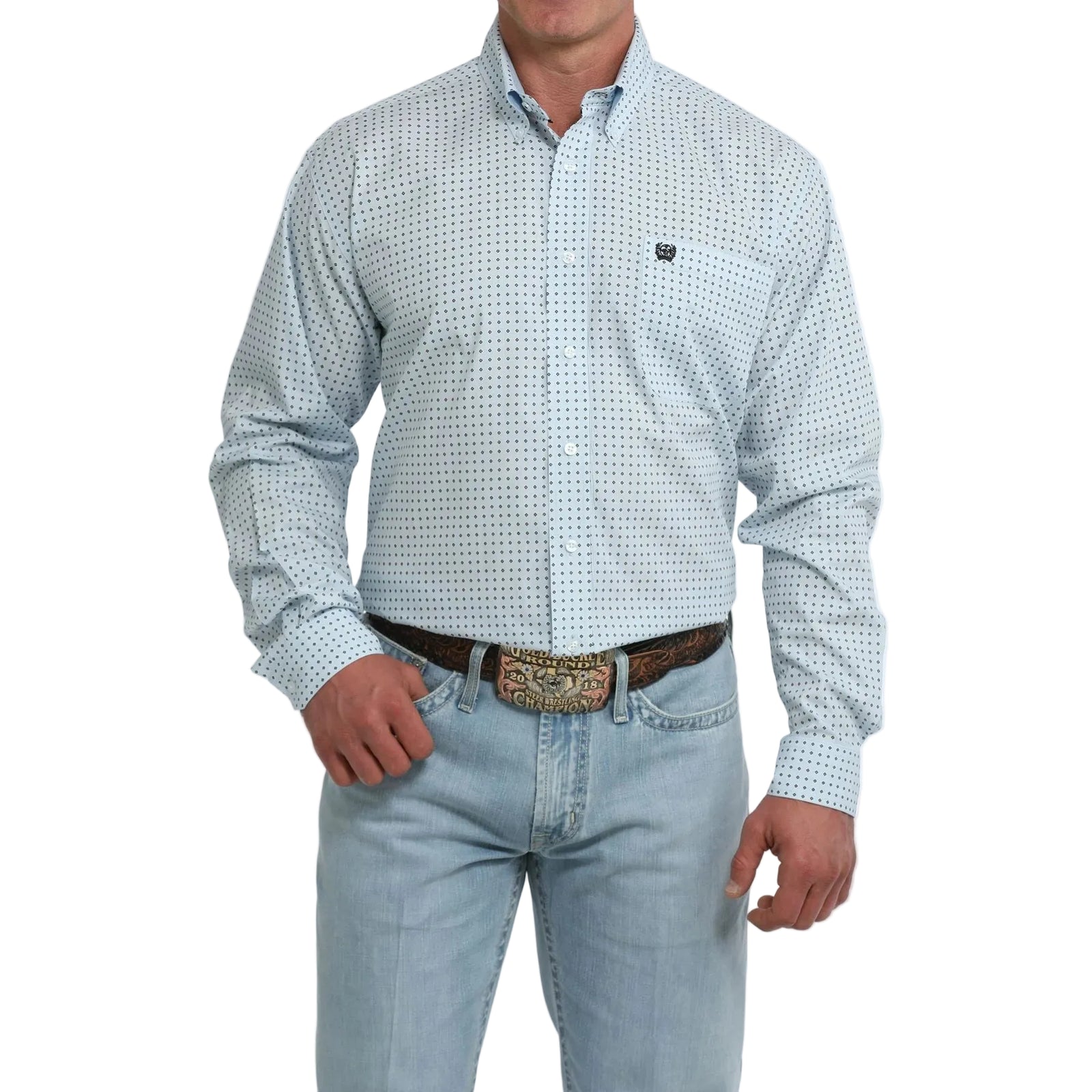 A man wearing a light blue and white micro-patterned button-down shirt with light-wash jeans, a brown belt, and a large western-style buckle, shown from the neck down on a white studio background.