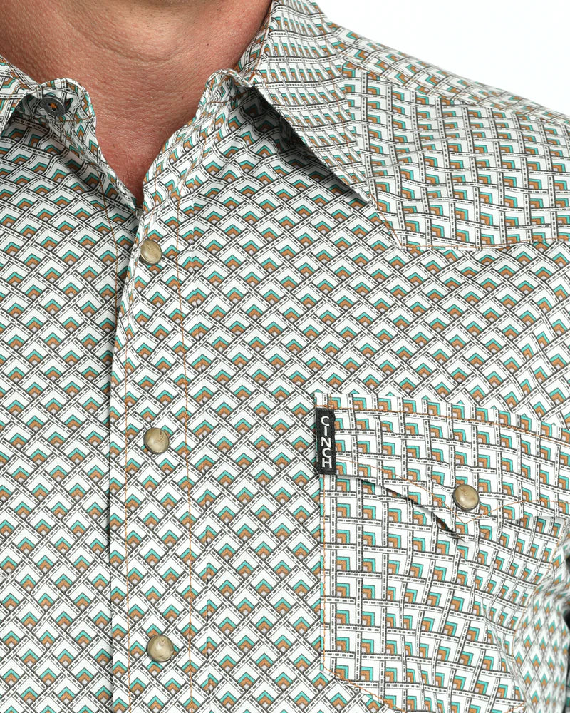 Cinch Men's Modern Fit Snap Front Western Shirt. Close-up of a patterned shirt with a brand label visible