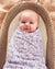 Alimrose Muslin Swaddle Liberty Blue. Floral swaddle blanket with 'Alimrose' branding on a white background