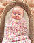 Alimrose Muslin Swaddle Rose Garden. Floral swaddle blanket with 'Alimrose' branding on a white background