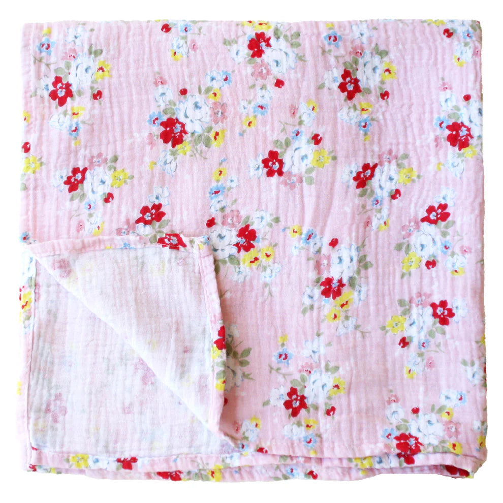 Floral-patterned blanket on a white background