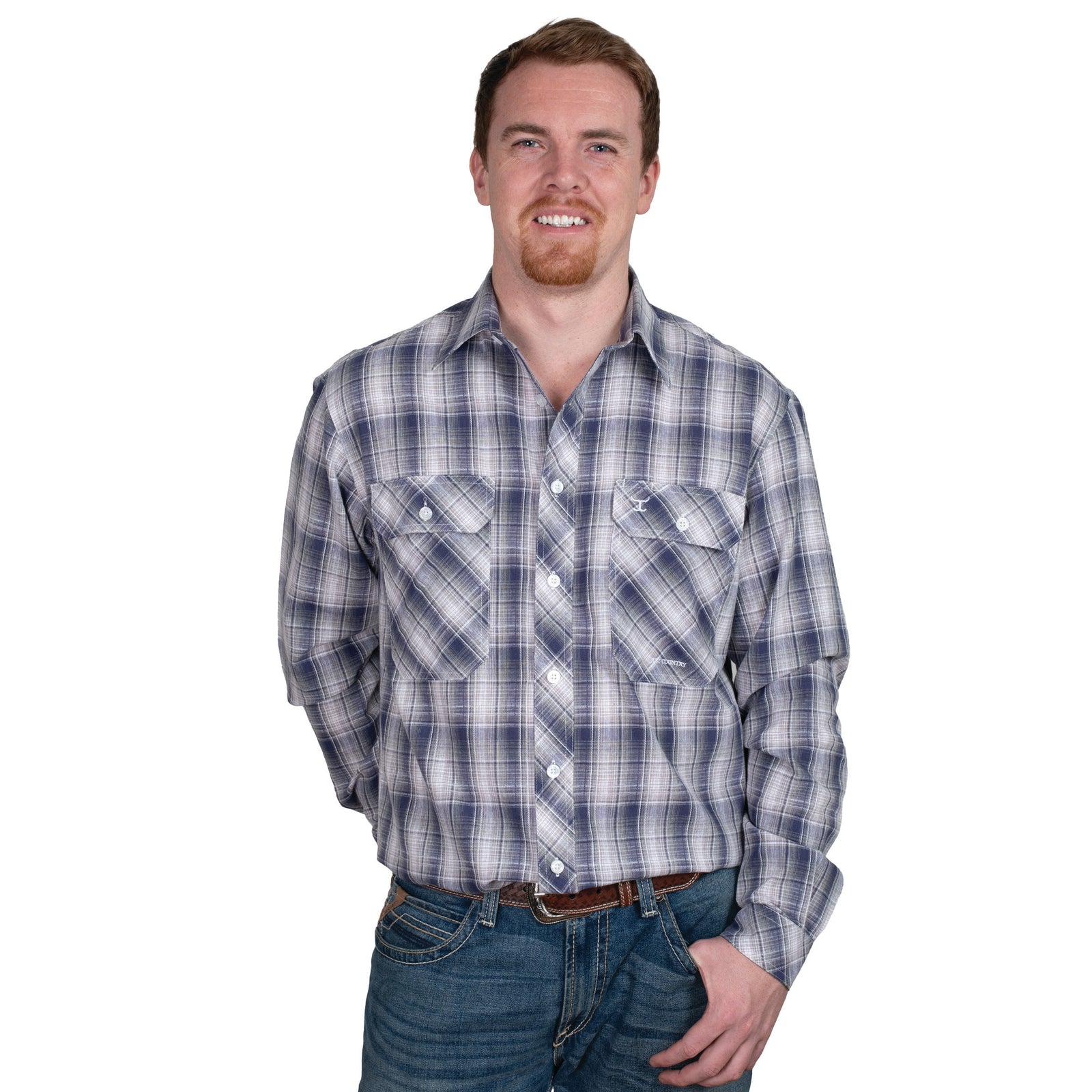 Just Country Men's Austin Full Button Workshirt. A man wearing a long-sleeved plaid workshirt with full button closure, pocket on the chest, and side pleats.