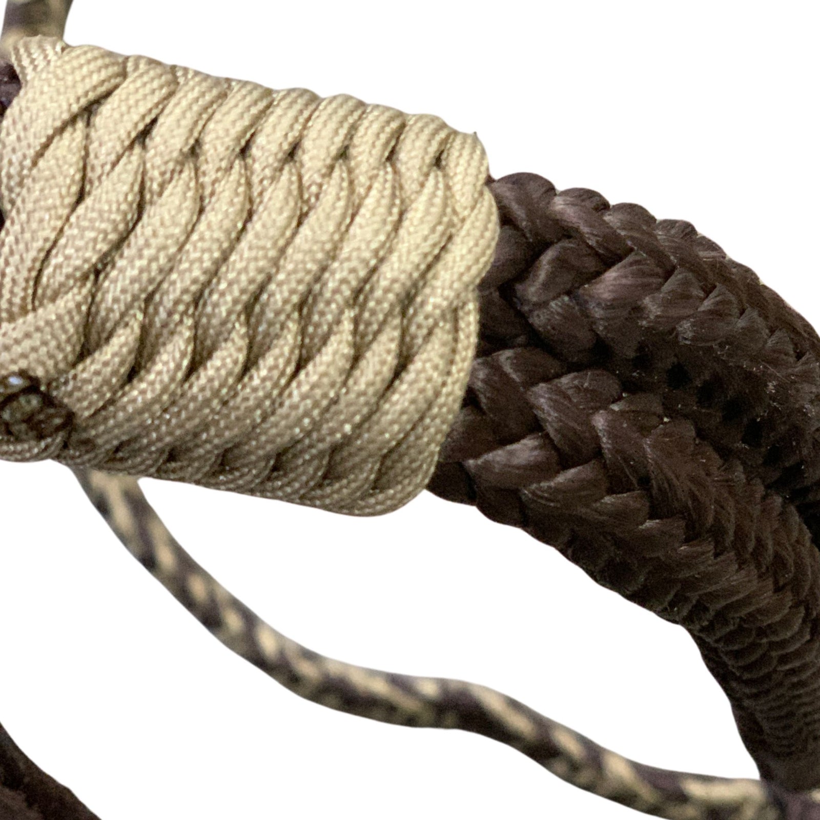 Professional-grade bull rope engineered for serious ropers. This 9-plait American-style rope features a 7/8" handle and tail for balanced control and durability. The 20" handle base with full lacing and 2 3/4" riser provides the grip and response serious competitor's demand. Built to perform in the arena, rodeo after rodeo.