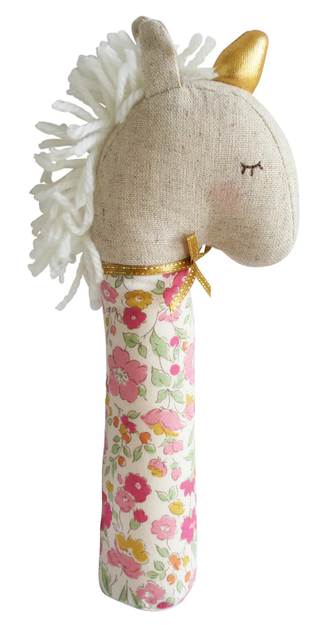 Alimrose Yvette Unicorn Squeaker Rose Garden. Unicorn-shaped rattle with floral pattern on a white background