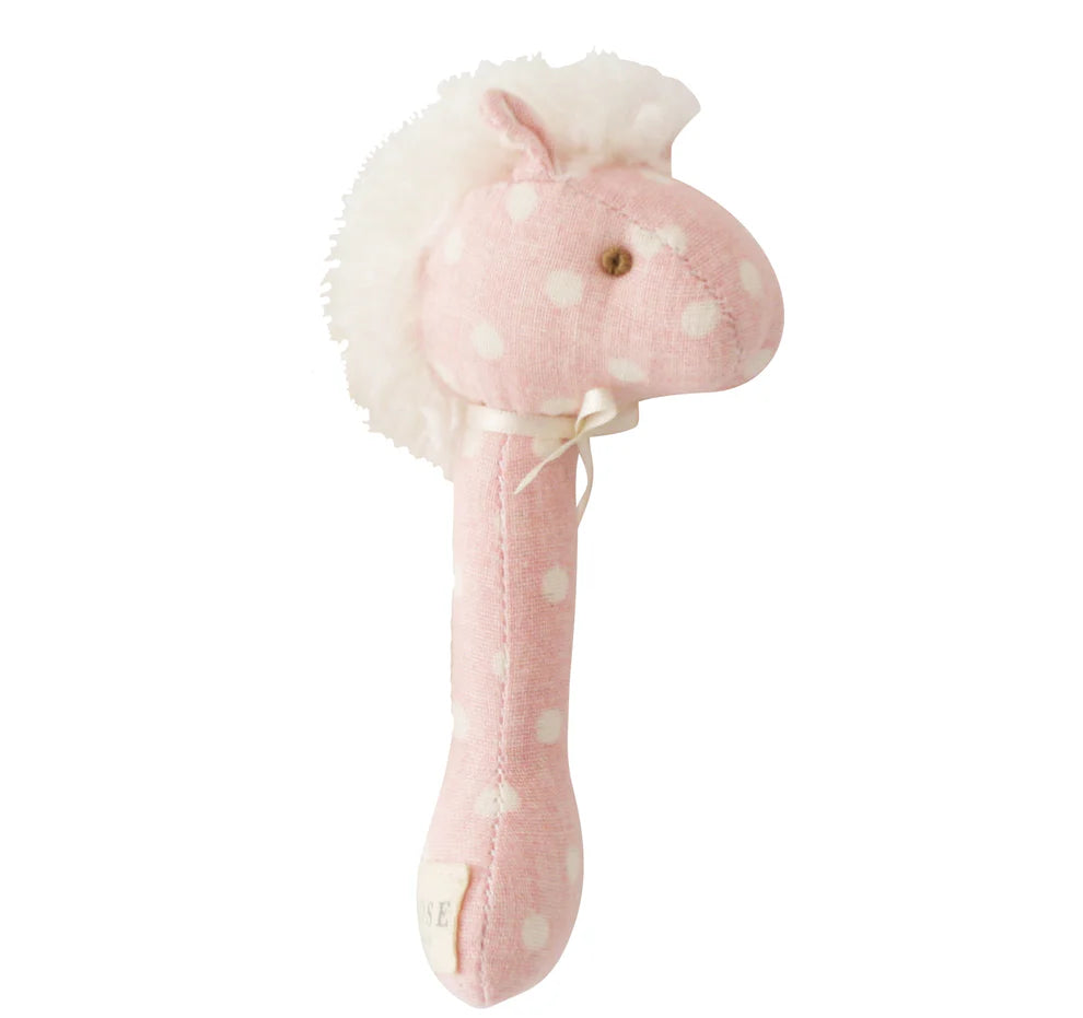 Alimrose Horse Stick Rattle Pink White Spot. Pink plush toy with white polka dots on a white background