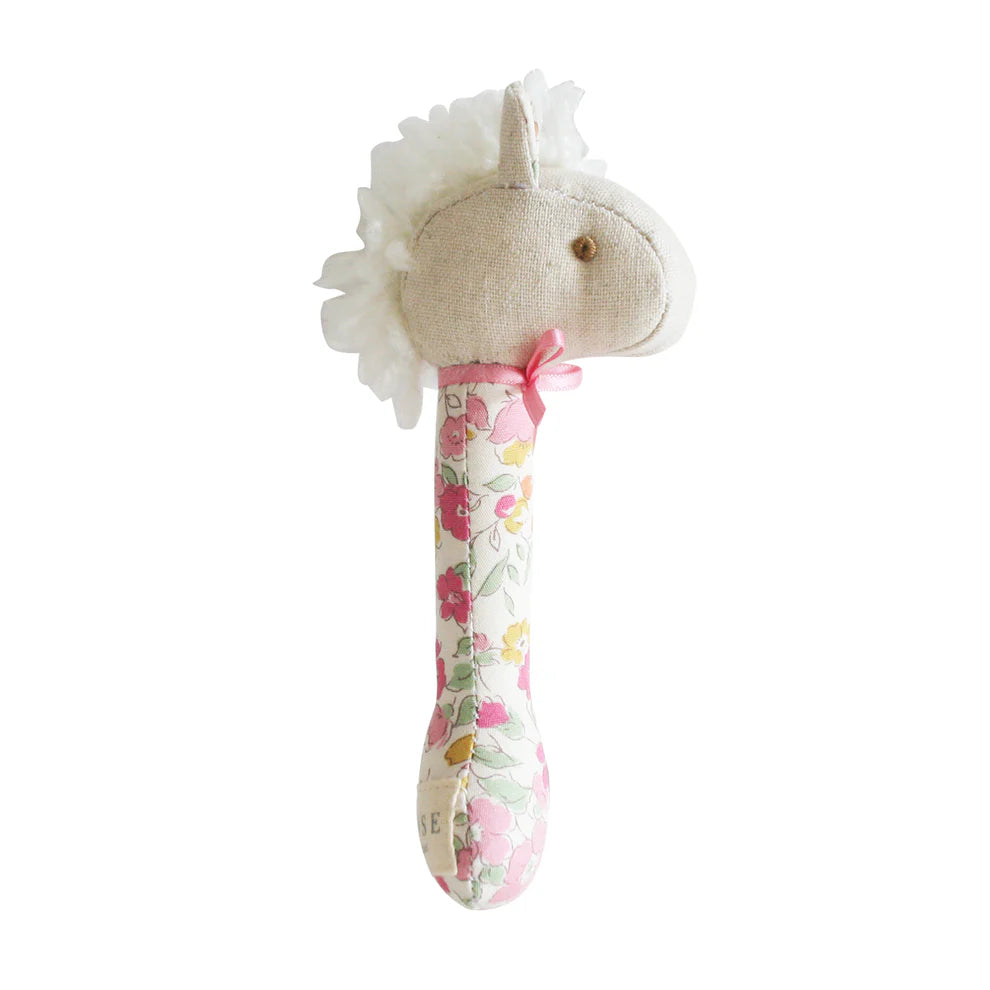 Alimrose Horse Stick Rattle Rose Garden. Unicorn-shaped rattle with floral pattern on a white background