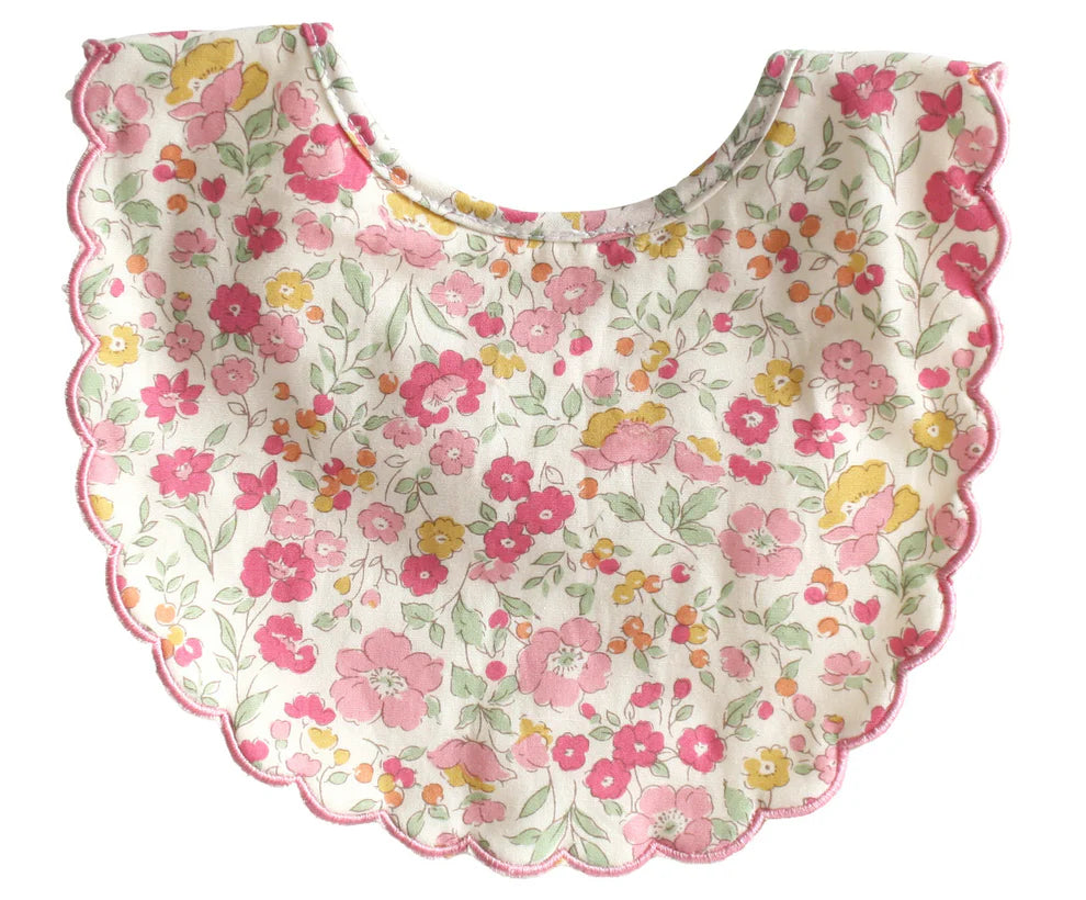Alimrose Scallop Bib Rose Garden. Floral-patterned bib on a white background