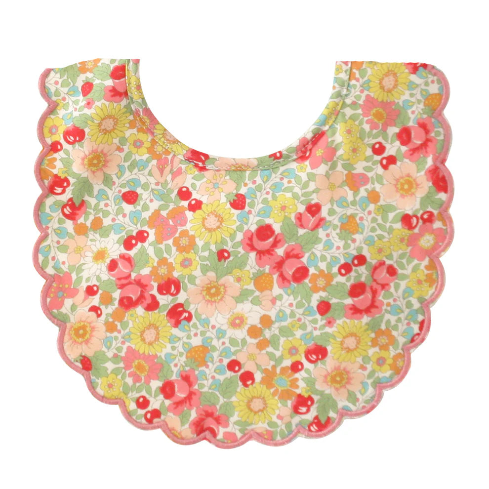 Floral patterned bib on a white background