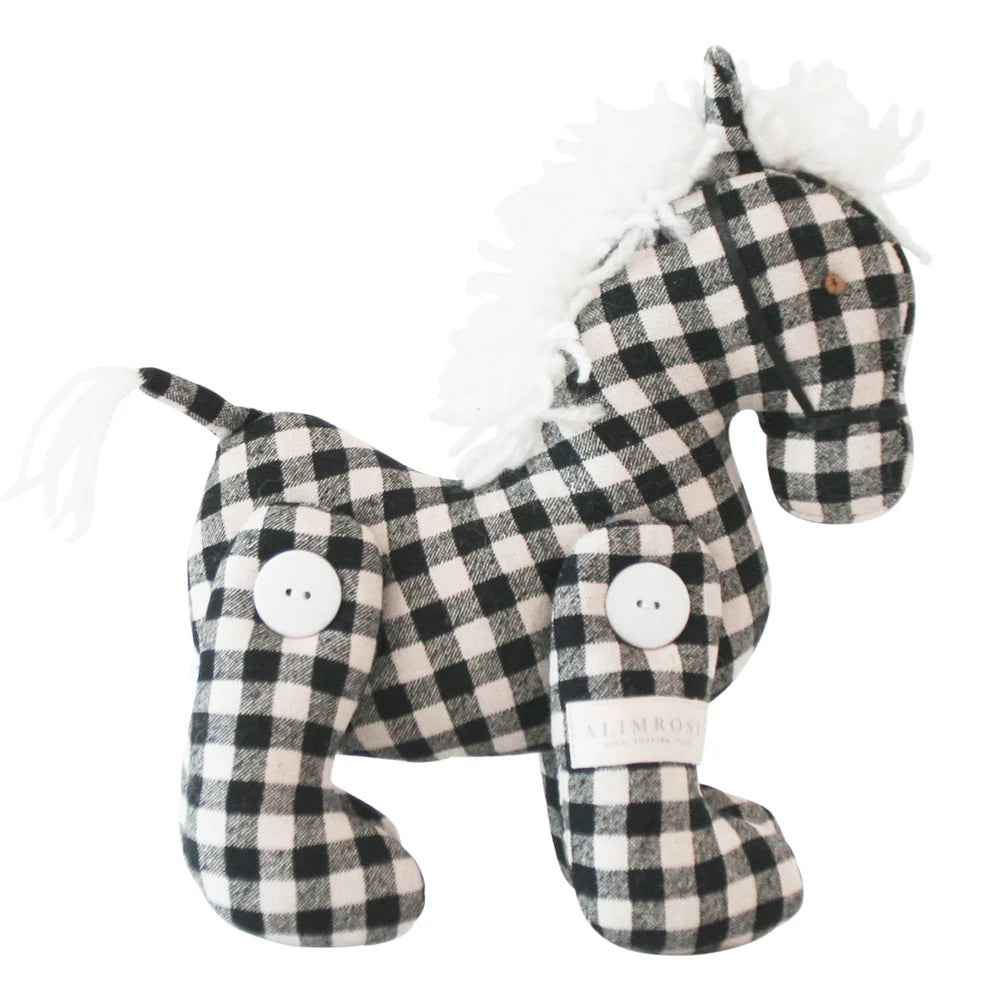 Alimrose Jointed Pony 22cm Black Check. Black and white checkered dog-shaped plush toy on a white background