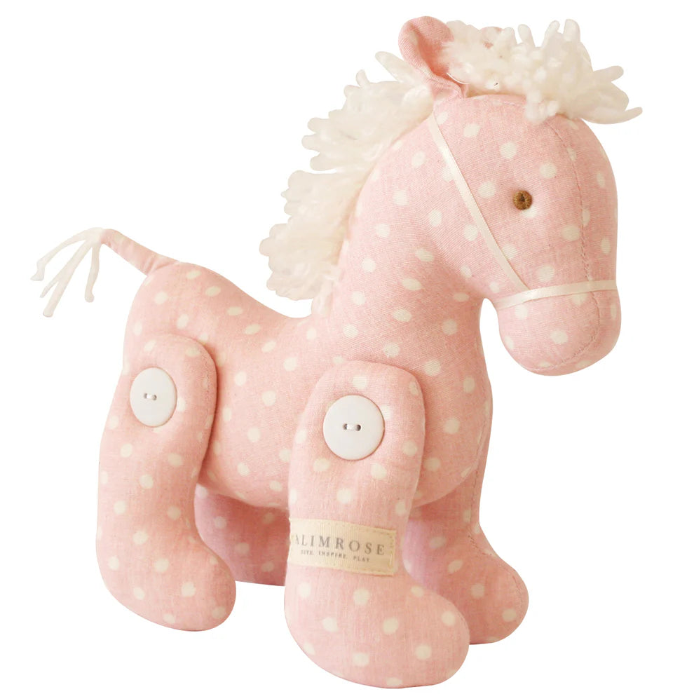 Alimrose Jointed Pony 22cm Pink White Spot. Pink polka dot plush horse toy with a white mane on a white background